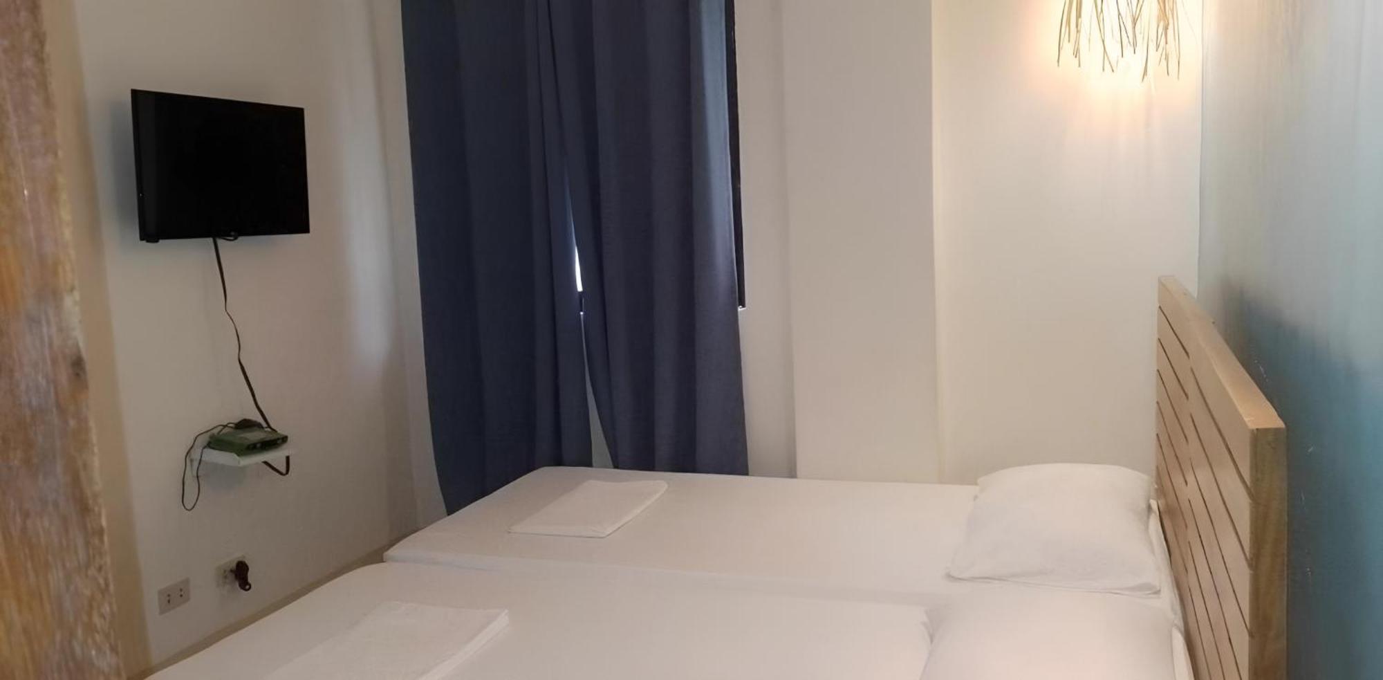 Amos Pili Tree Inn Powered By Cocotel إل نيدو المظهر الخارجي الصورة