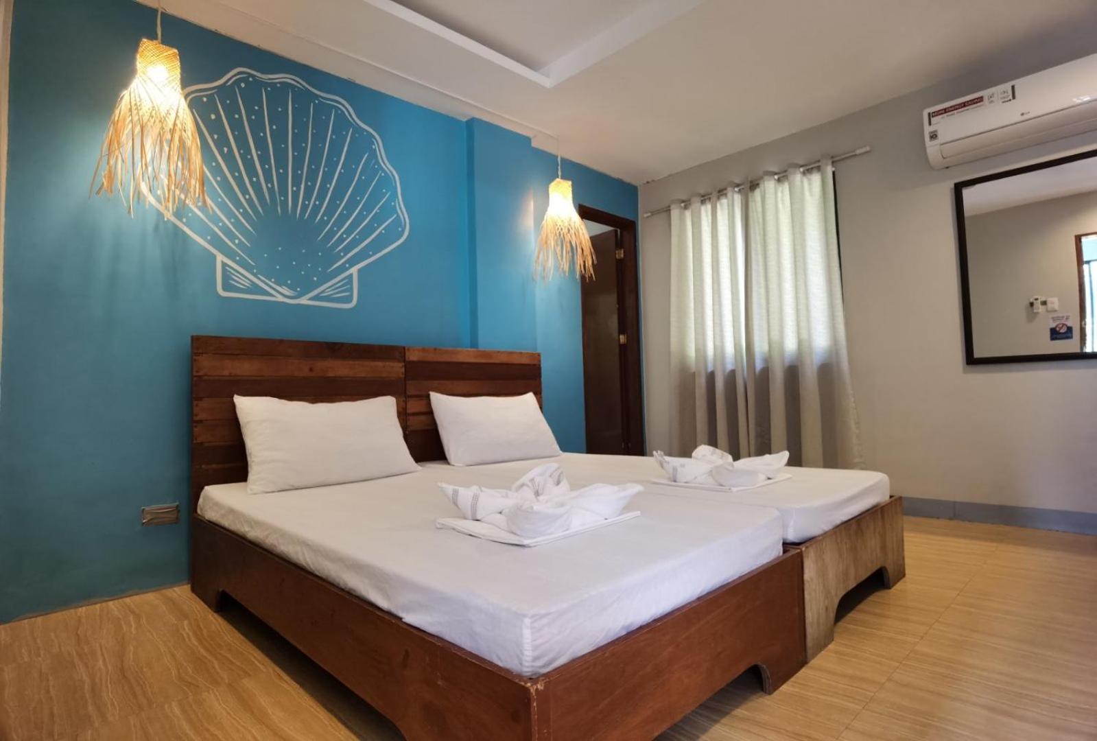 Amos Pili Tree Inn Powered By Cocotel إل نيدو الغرفة الصورة