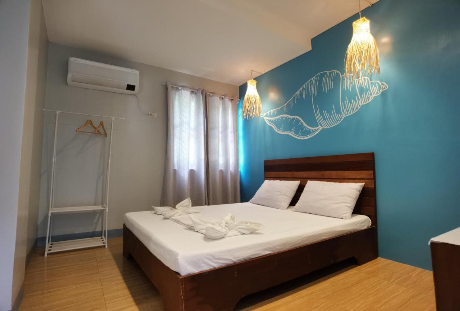 Amos Pili Tree Inn Powered By Cocotel إل نيدو الغرفة الصورة
