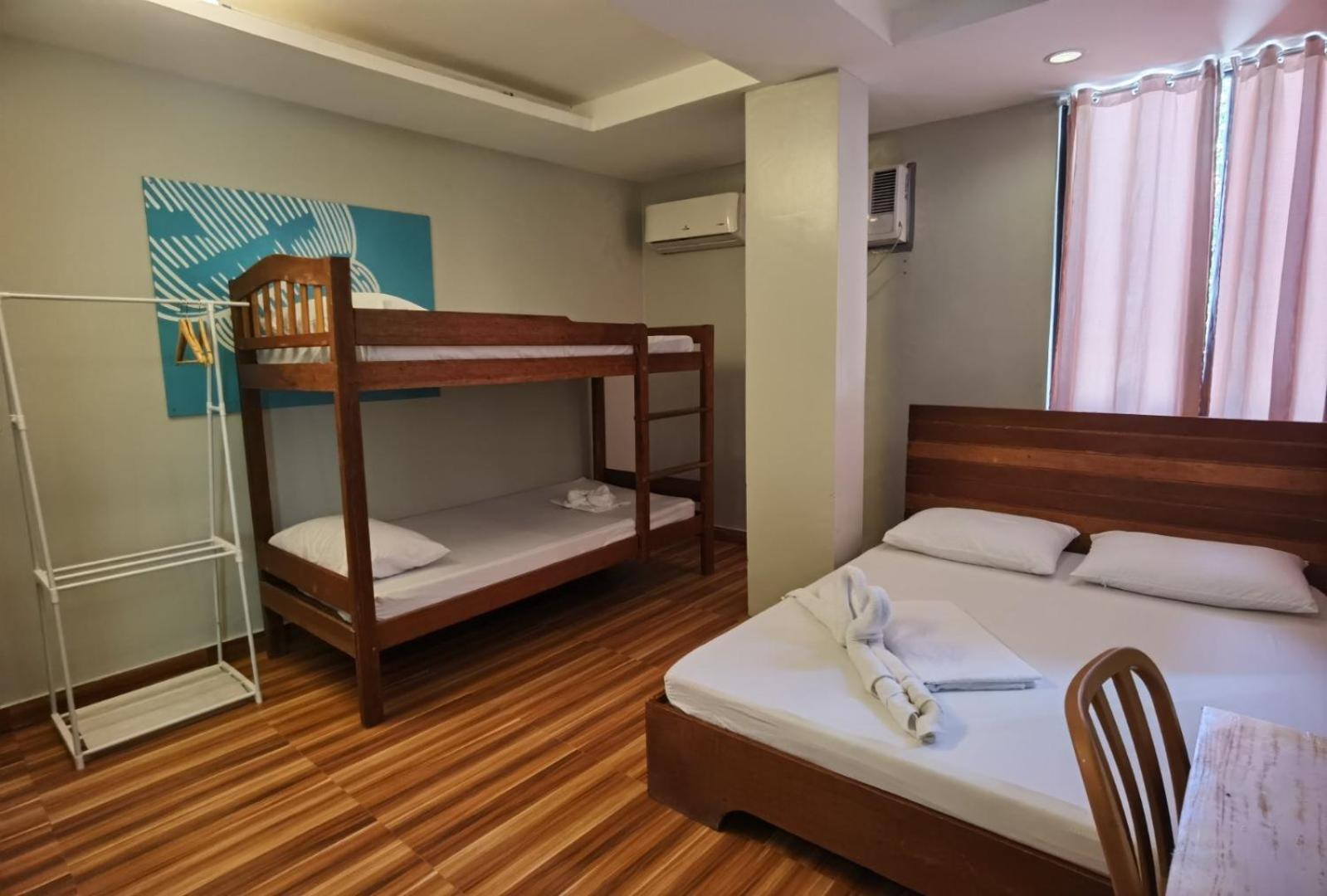 Amos Pili Tree Inn Powered By Cocotel إل نيدو الغرفة الصورة