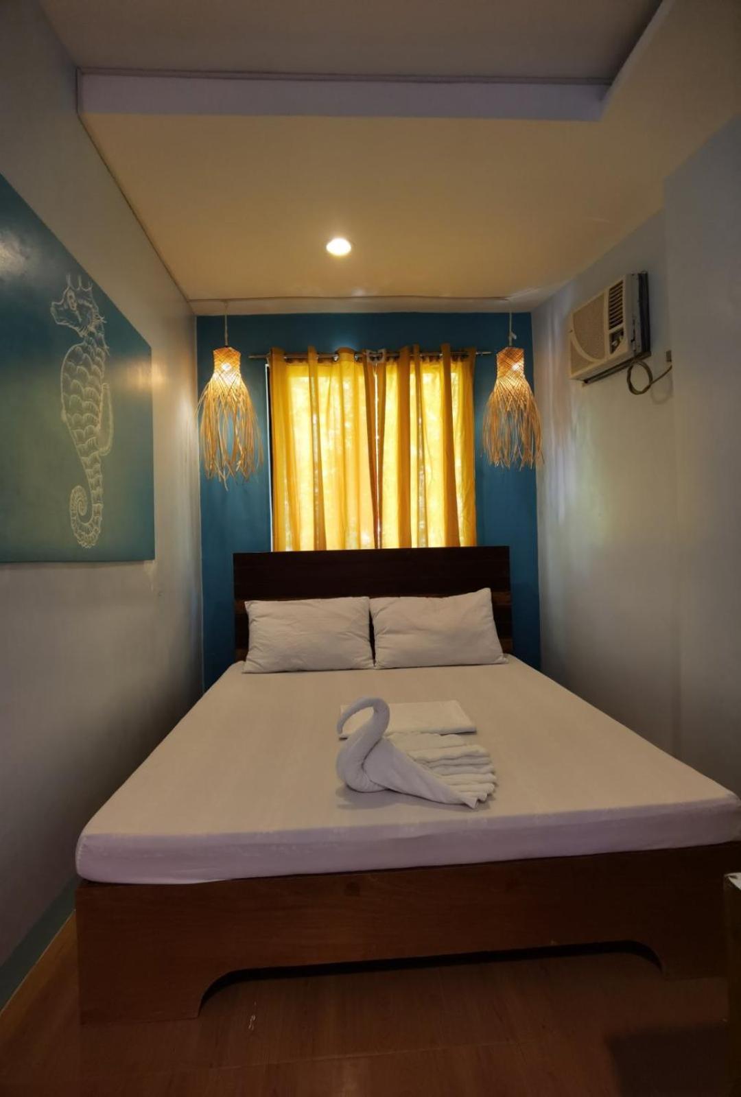 Amos Pili Tree Inn Powered By Cocotel إل نيدو الغرفة الصورة