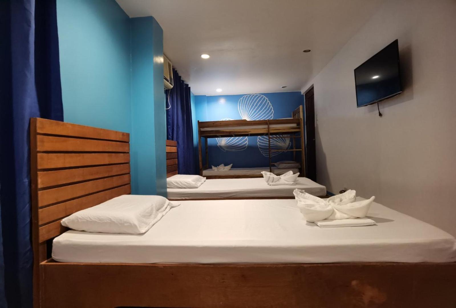Amos Pili Tree Inn Powered By Cocotel إل نيدو الغرفة الصورة