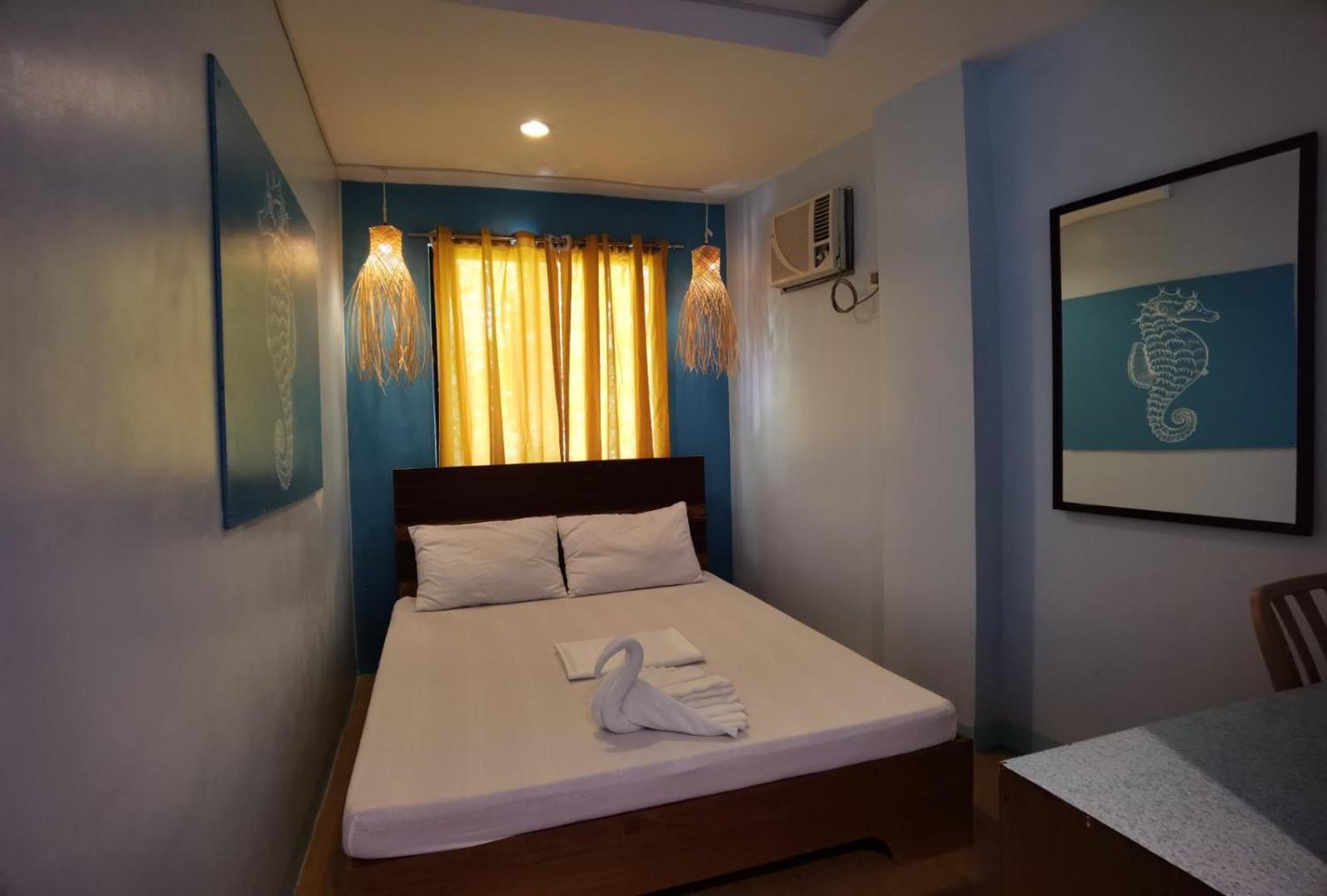 Amos Pili Tree Inn Powered By Cocotel إل نيدو الغرفة الصورة