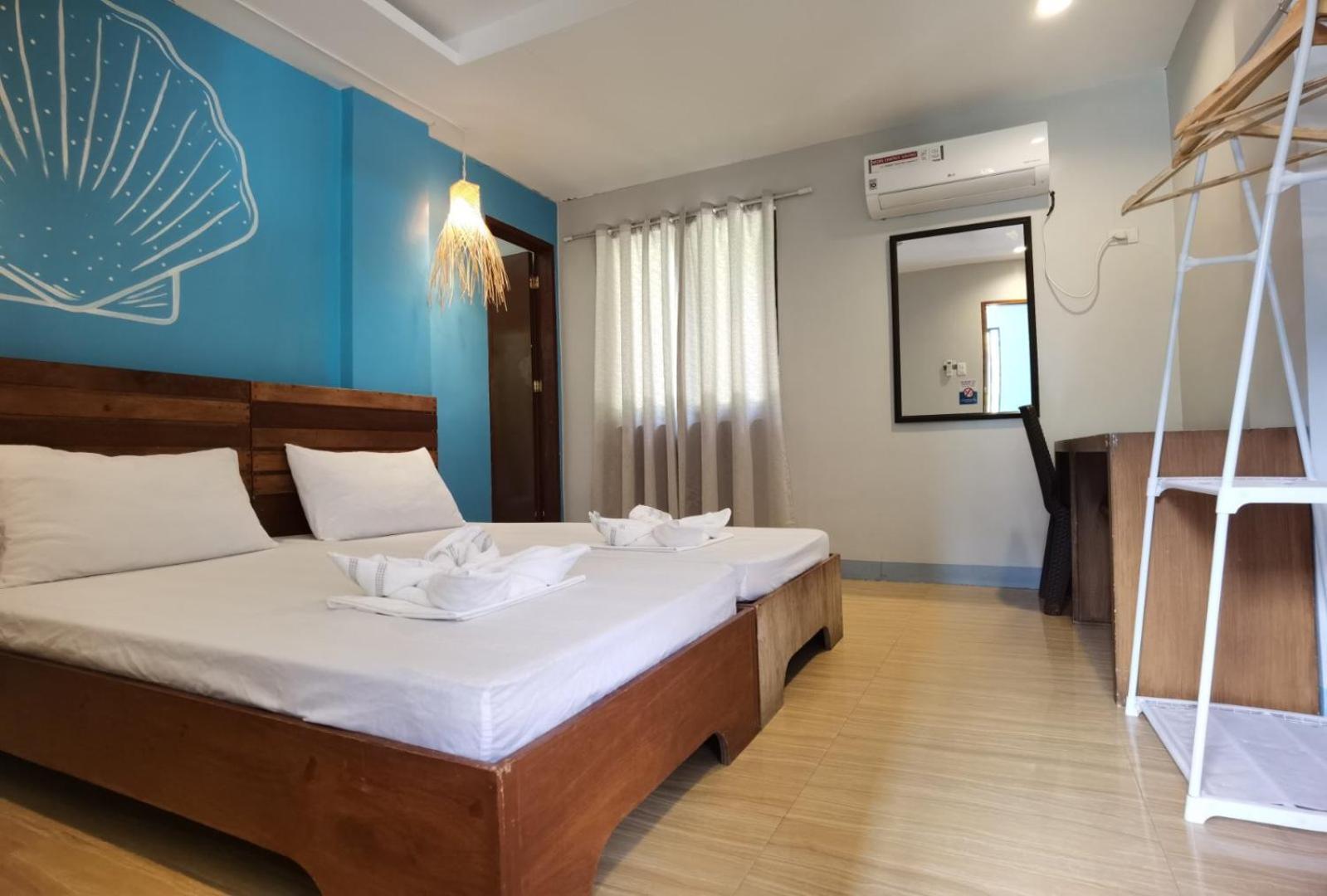 Amos Pili Tree Inn Powered By Cocotel إل نيدو الغرفة الصورة