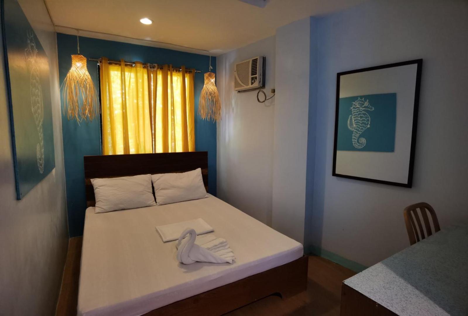 Amos Pili Tree Inn Powered By Cocotel إل نيدو الغرفة الصورة