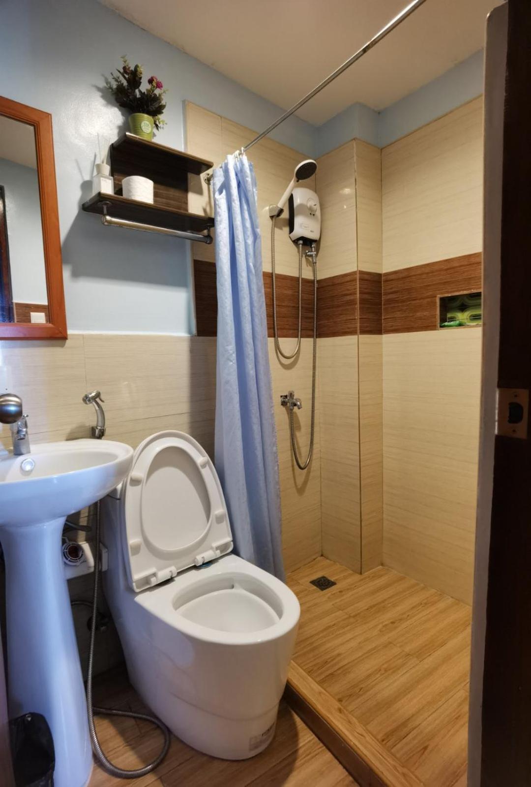 Amos Pili Tree Inn Powered By Cocotel إل نيدو الغرفة الصورة