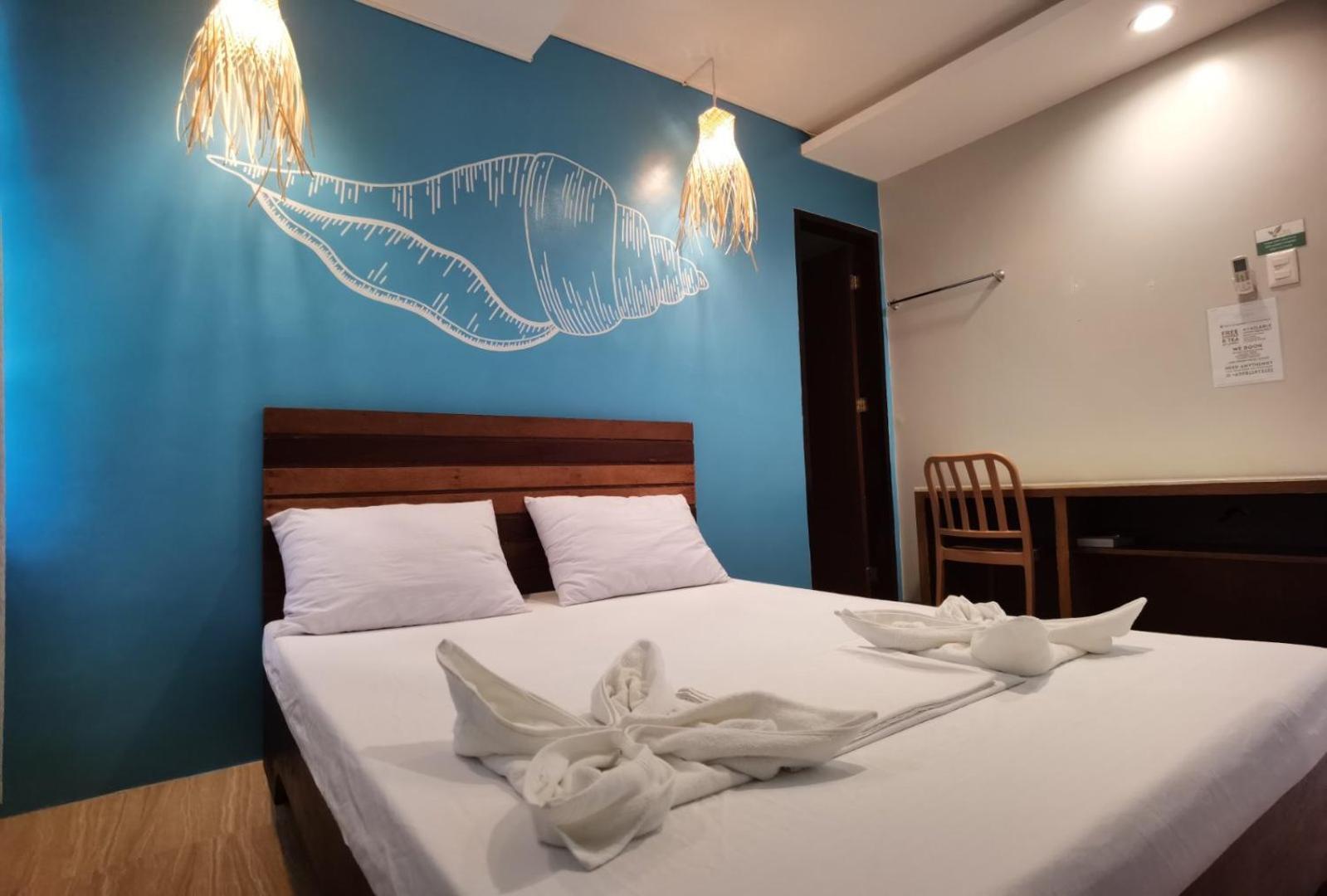 Amos Pili Tree Inn Powered By Cocotel إل نيدو الغرفة الصورة